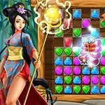 Một nhân vật nữ trong trang phục truyền thống đứng cạnh bảng các viên đá quý nhiều màu sắc
