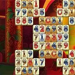 Các khối gạch với số và chữ cái được sắp xếp trên nền màu đỏ và vàng