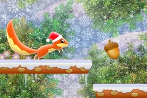 Một con sóc đỏ đội mũ ông già Noel đang nhảy sang một phiến băng hướng về phía một quả hạt dẻ giữa khung cảnh rừng có tuyết rơi