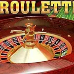 Bàn quay roulette trong sòng bạc với các con số màu đỏ và đen nổi bật