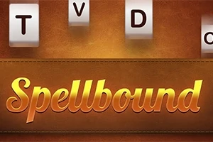 Chữ Spellbound màu vàng trên nền nâu, cùng các khối chữ cái T, V, D, O