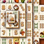 Các ô xếp chồng lên nhau với các biểu tượng như số, quả bí ngô, bắp ngô, và lá mùa thu